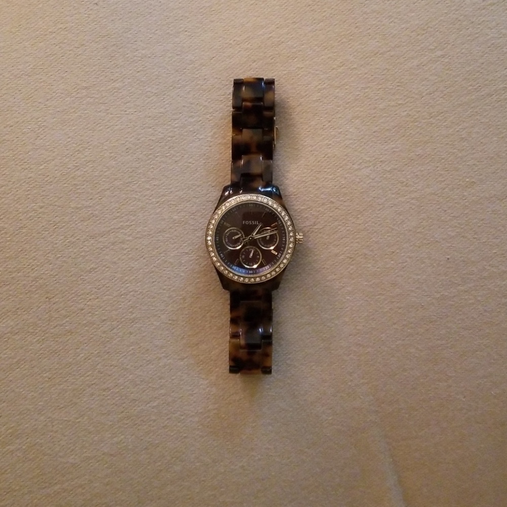 Fossil tortoise shell watch with diamond face